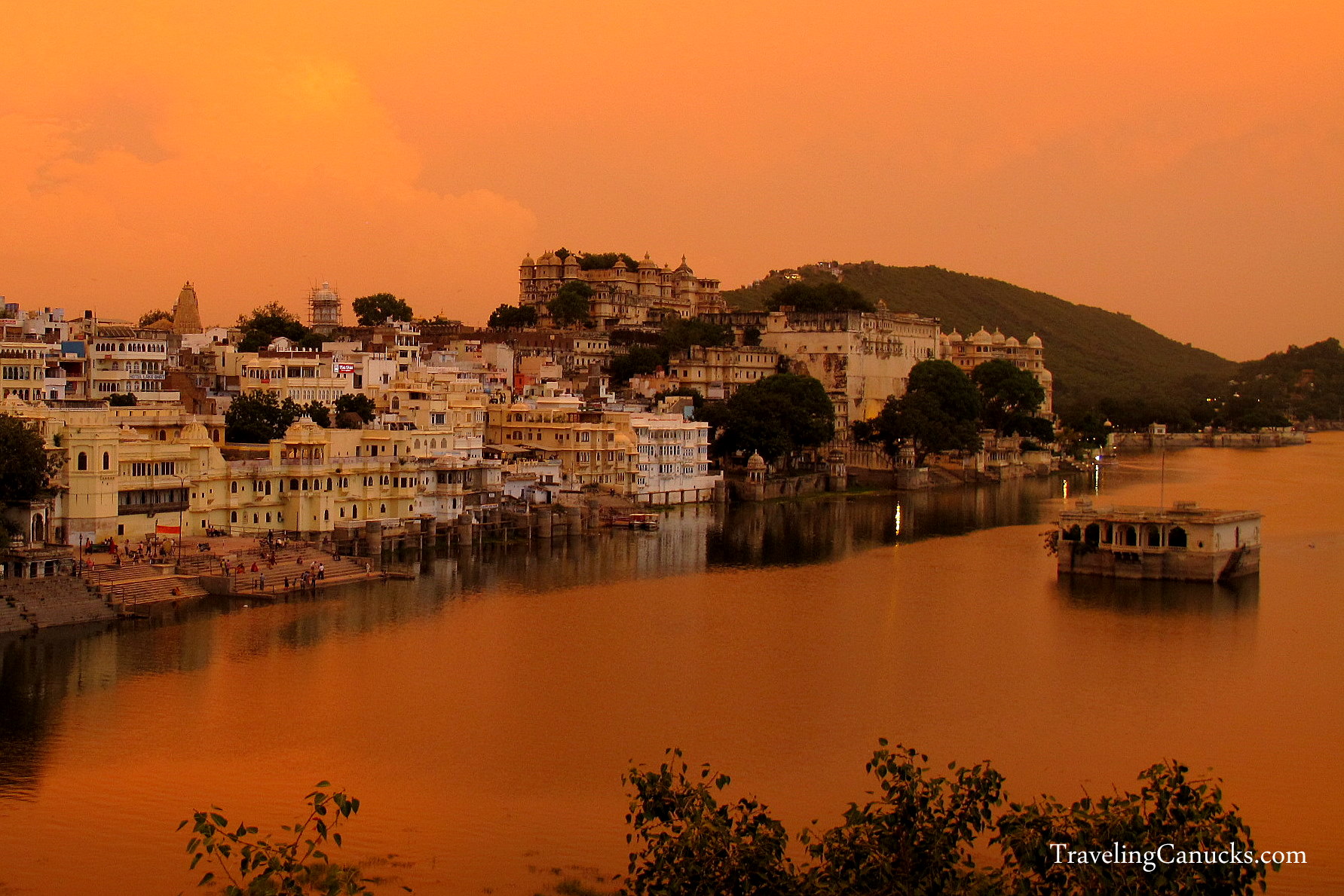 Brilliant Sunset over Udaipur City Palace in Rajasthan, India