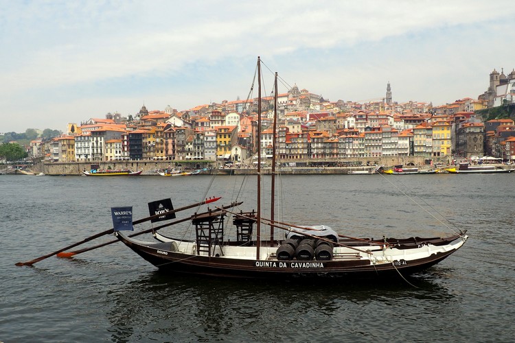 photo of old boat on Douro River in Porto Portugal