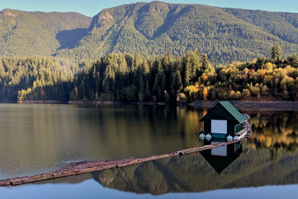 Capilano Reservoir, Grouse Mountain, Cleveland Dam, Green house on the lake, North Vancouver, British Columbia