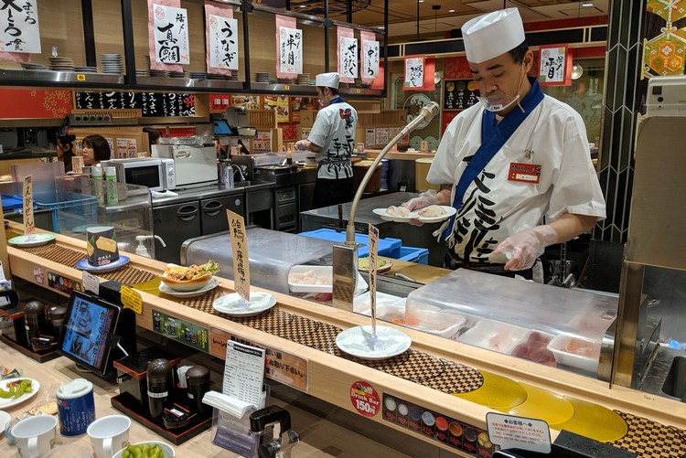 Beginners Guide to Food in Japan for first time visitors. Sushi restaurant in Kobe Japan