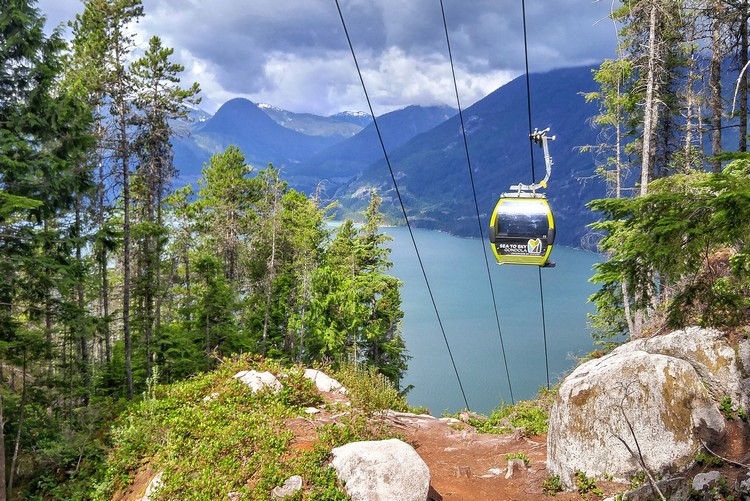 view of gondola from Sea to Sky trail, hiking up to the summit, view of Howe Sound and Sea to Sky gondola from trail lookout point