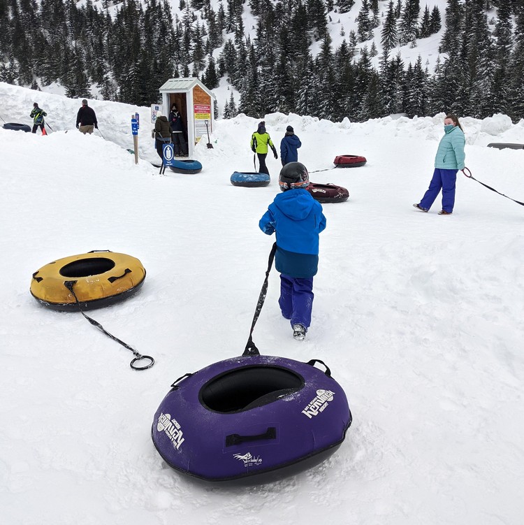 snow tubing magic carpet at Sasquatch Mountain resort in British Columbia