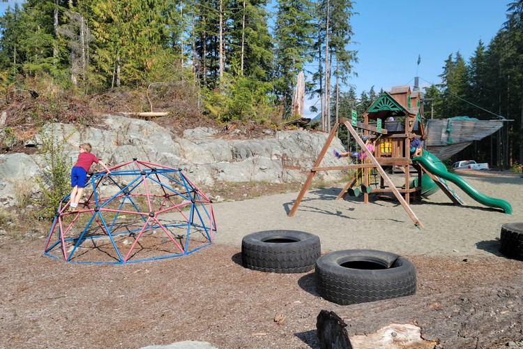 The Highlands campground playground with zipline at Moutcha Bay Resort