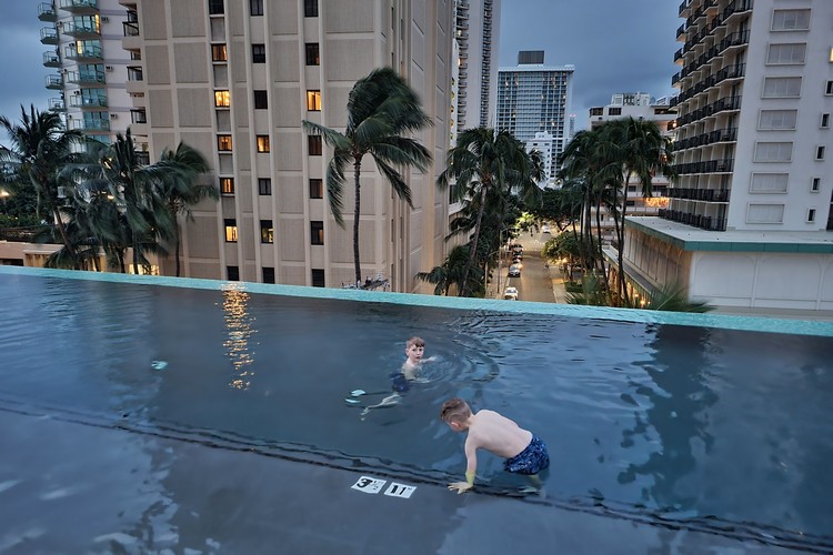 swimming in infinity pool at Alohilani Resort Waikiki Beach, Honolulu Oahu Hawaii 