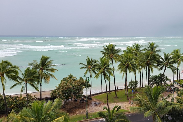 ocean and beach view of Waikiki Beach from Alohilani Resort balcony 
