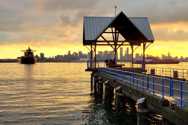 Beautiful yellow sunset at the Pier at Waterfront Park in North Vancouver