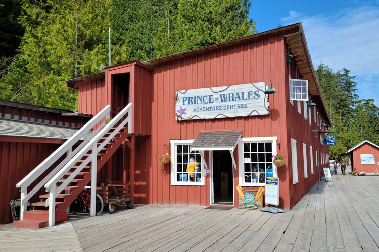 Prince of Whales Adventure Centres Telegraph Cove, red wooden building on boardwalk