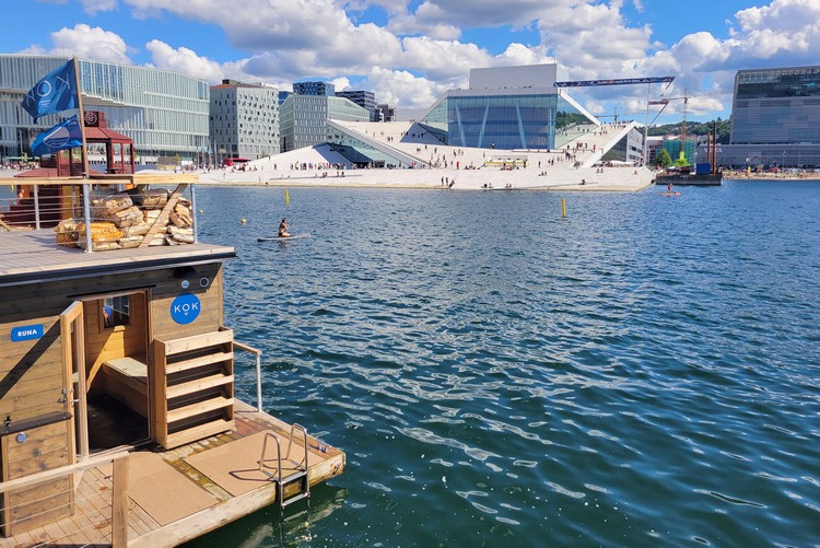 floating sauna in front of Oslo Opera House in Oslo fjord