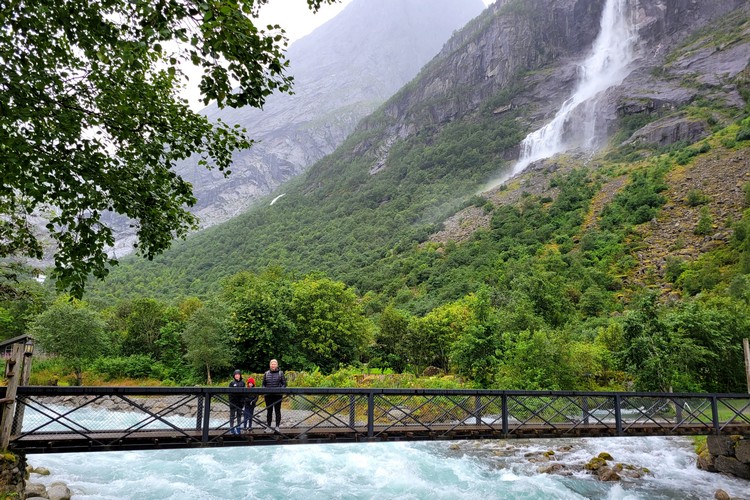 Briksdalsbreen bridge and waterfall at Jostedal Glacier national park in Norway