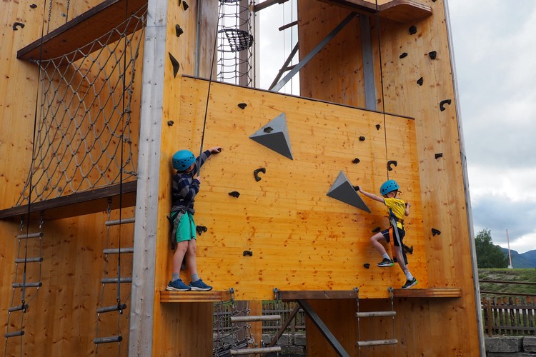 Outdoor rock climbing course at Lom Aktivitetspark, Norway road trip with kids