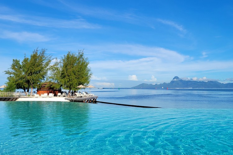 view of Moorea Island from beach hotel Te Moana Tahiti Resort, where to stay in Papeete Tahiti, French Polynesia