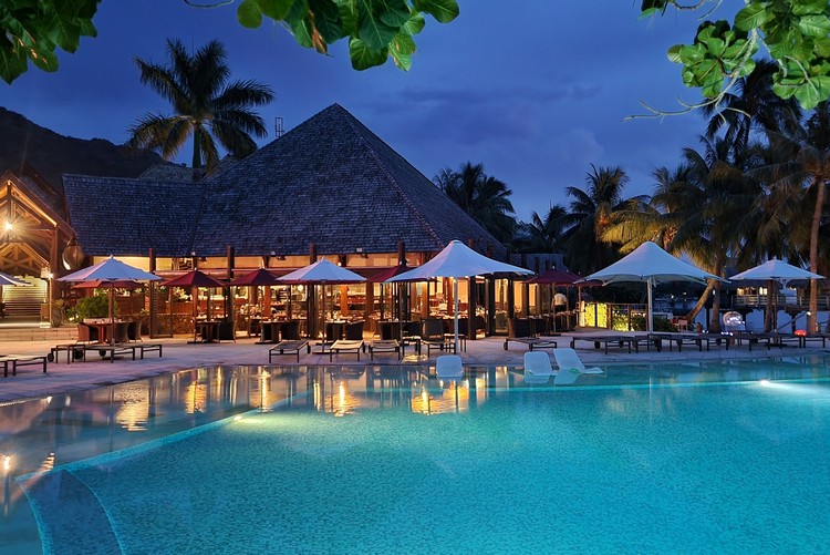 pool at Manava Beach Resort Moorea at night. Cost of travel to Moorea French Polynesia with kids