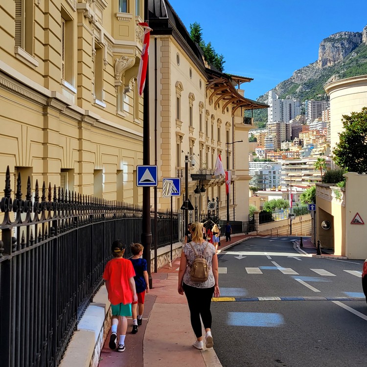 walking the streets of Monaco with family. Exploring city by walking instead of transportation