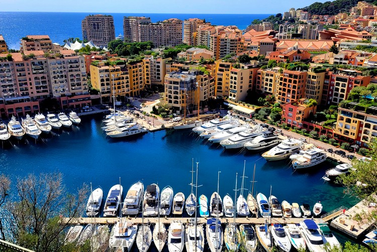 Port of Fontvieille viewpoint from The Rock of Monaco and Prince's Palace lookout point, photo of colorful buildings and harbor in Monaco