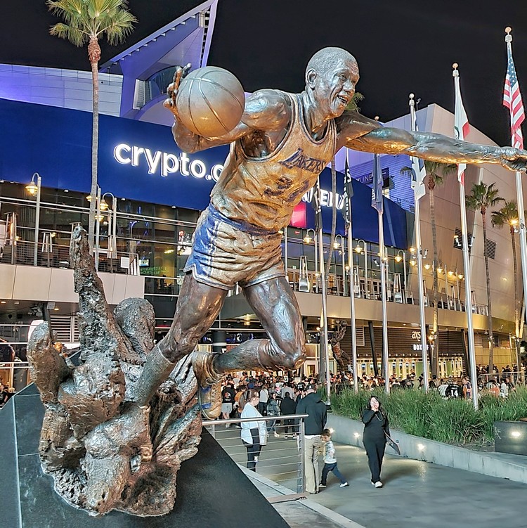 Magic Johnson statue at Star Plaza in front of Cryptocom Arena in downtown Los Angeles California