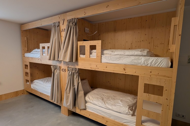 one side of the 8 person dorm room at Angeiras Beach Hostel, Lavra, Portugal