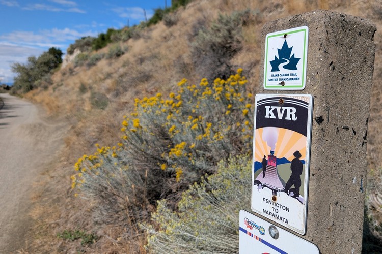 Kettle Valley Rail Trail sign, popular walking trail in Penticton British Columbia Canada